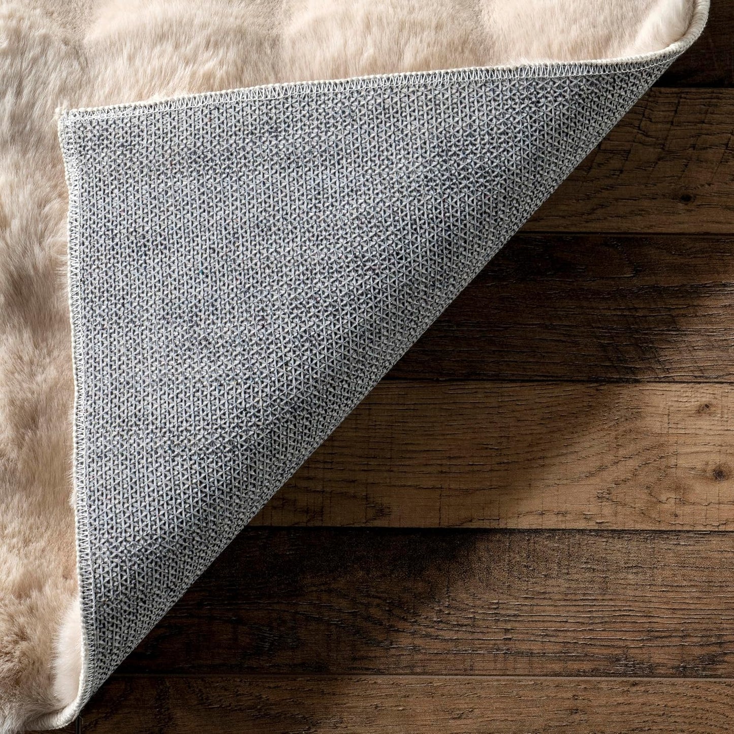 nuLOOM Jeni Solid Faux Rabbit Machine Washable Area Rug, Oval 5' x 7'6", Beige